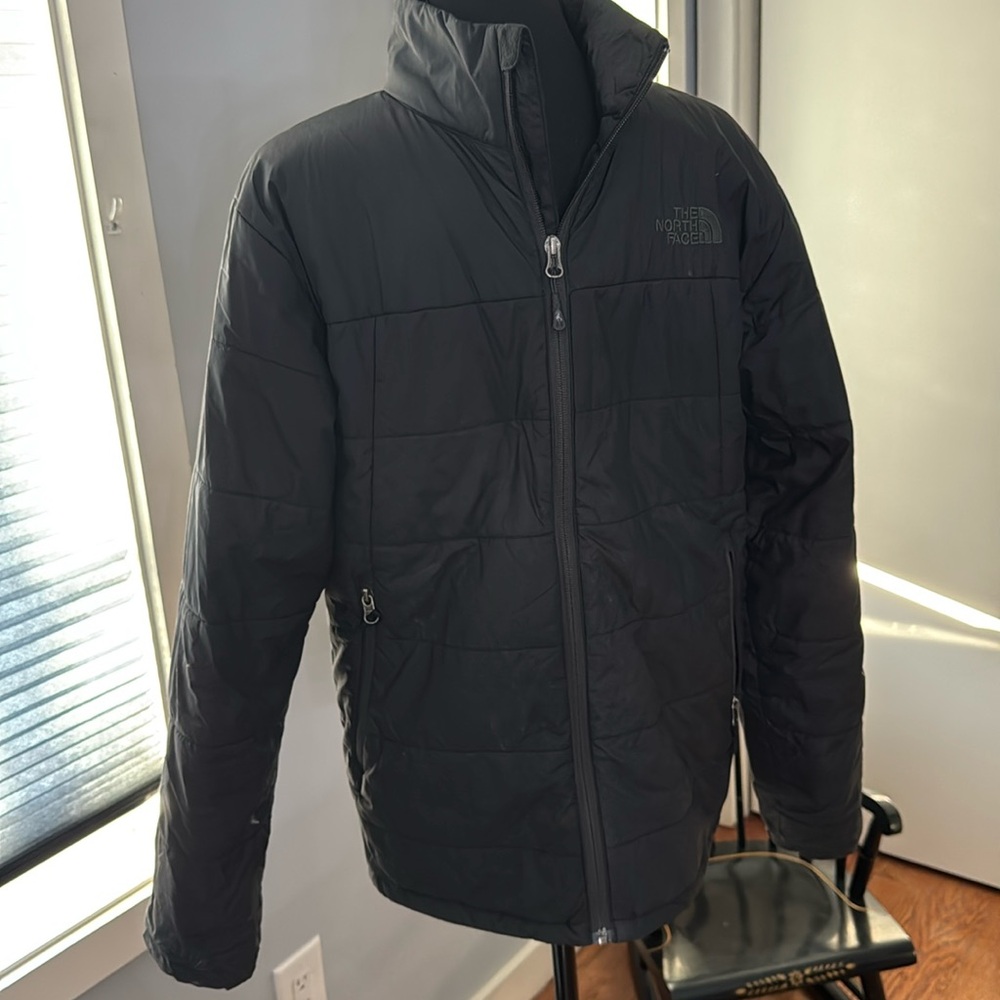 Men’s North face jacket size small.